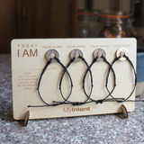 MyIntent card board holding 4 MyIntent bracelets