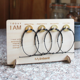 MyIntent card board holding 4 MyIntent bracelets