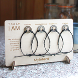 MyIntent card board holding 4 MyIntent bracelets