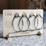 MyIntent card board holding 4 MyIntent bracelets
