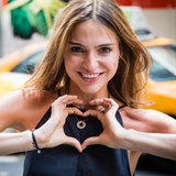 Woman wearing MyIntent token necklace