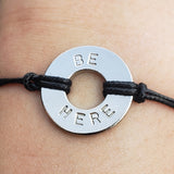 MyIntent Classic Black String Bracelet Nickel Token with the words BE HERE
