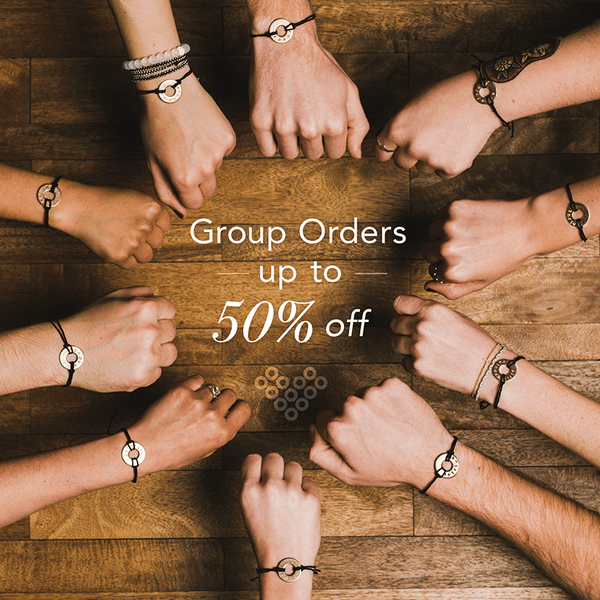 A group wearing their MyIntent Custom Black String Bracelets each unique with their on words