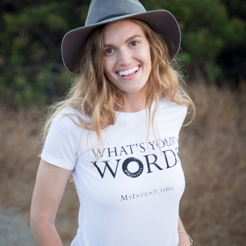 A girl wearing her MyIntent white t-shirt with the logo: "What's Your Word?" and MyIntent.Org