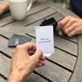Friends using their MyIntent Question Cards with the question "Who are your heroes?" 